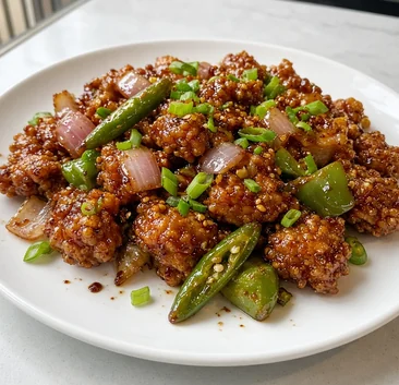 Chilli chicken with green chillies, onion and green pepper